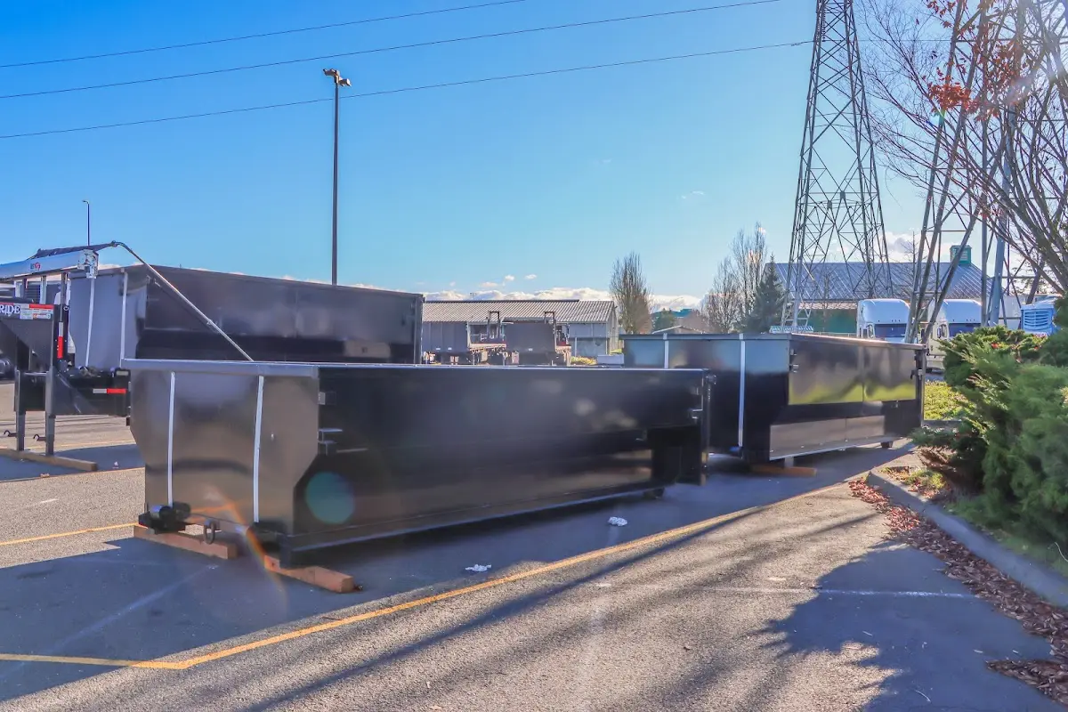 Roll-off dumpster ready for waste disposal at job site for 2 Yard Dumpster Rental in Dyer